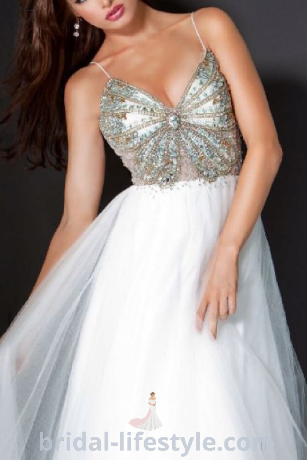 An elegant butterfly dress from the collection featuring a charming butterfly bodice design, perfect for dreamy brides seeking the latest trends in wedding attire. This flowy dress, along with other butterfly-inspired options, showcases unique styles for every bride