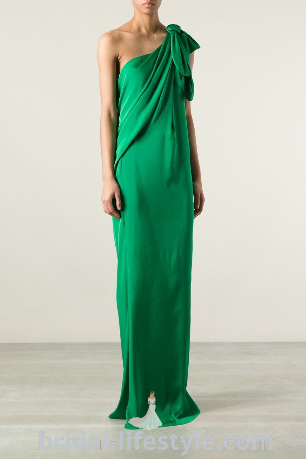 An elegant one shoulder drape dress in coral and green, perfect for bridesmaids or casual work outfits. Featuring maxi styles, this gown is suitable for red carpet dresses and simple wedding dresses. Find more inspiration and styles at bridal-lifestyle.com.