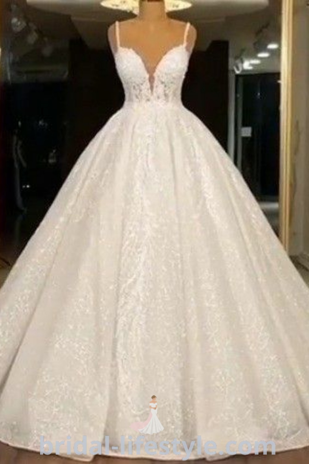 An elegant Pocahontas wedding dress displayed in front of a mirror, showcasing its satin mermaid design and lace details, perfect for romantic brides seeking dreamy styles. Find inspiration and the best dresses for your special day at bridal-lifestyle.com.