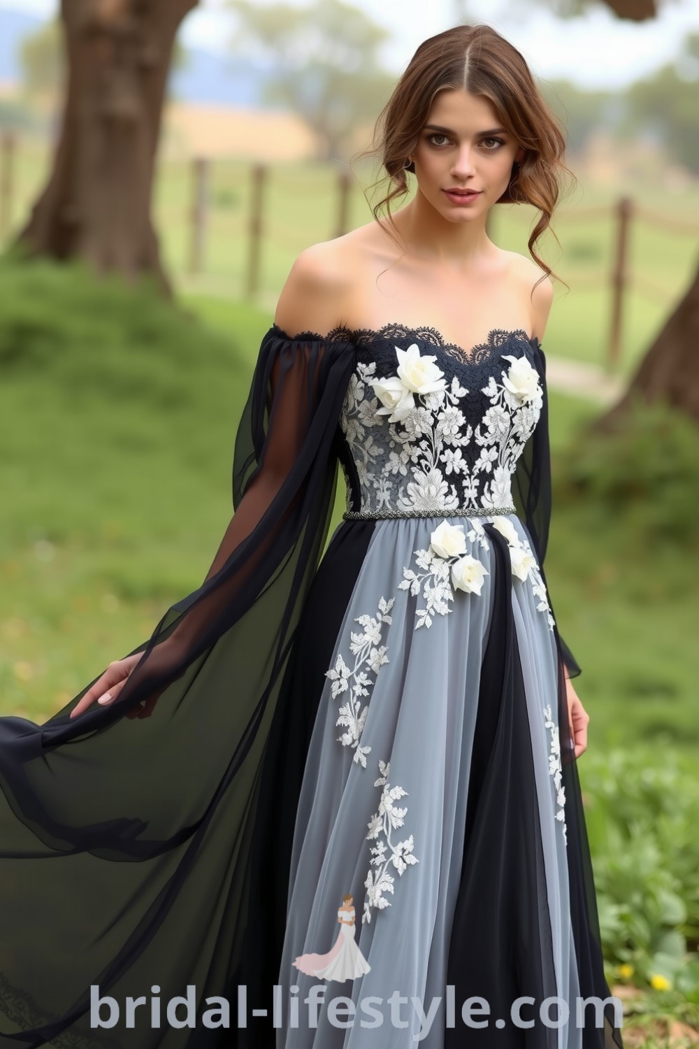 A beautiful black boho wedding dress made of lace and chiffon, featuring floral appliqués, an off-the-shoulder neckline, and a flowy silhouette. bridal-lifestyle.com