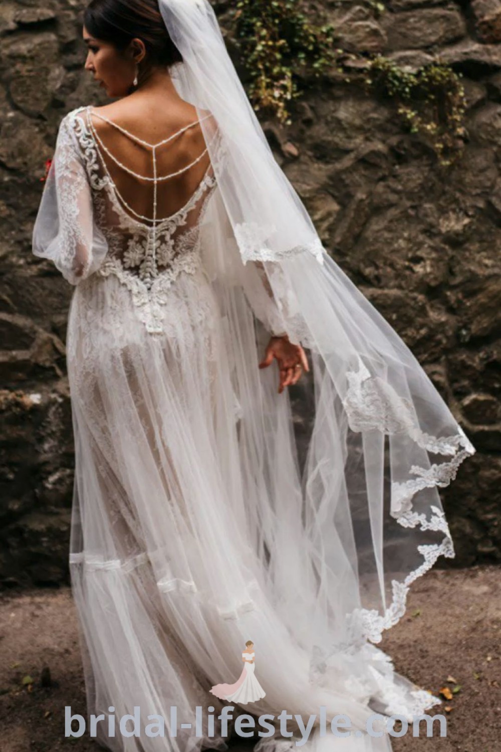 An elegant boho wedding dress featuring a romantic design, perfect for dreamy brides. Styled with a boho veil, this gown offers inspiration for rustic wedding themes and is ideal for brides seeking wedding dresses that reflect their unique taste. Explore beautiful bridal options at bridal-lifestyle.com.
