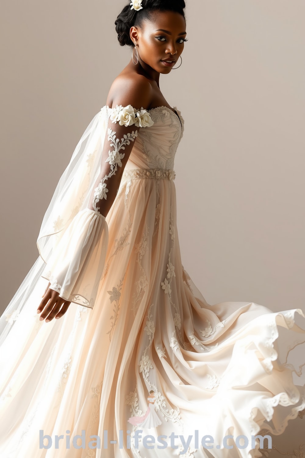 A beautiful Black bride wearing a boho flowery wedding dress with an off-the-shoulder neckline, bell sleeves, and floral appliqués. The dress flows elegantly to the floor, catching the light beautifully. bridal-lifestyle.com