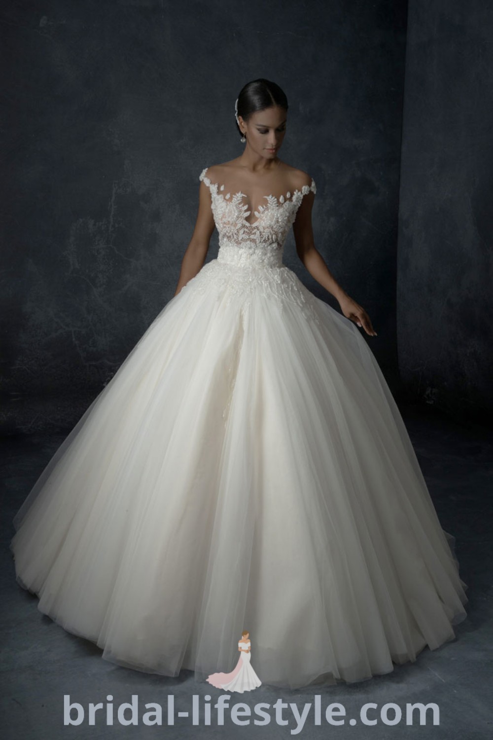 An elegant wedding dress with princess sleeves displayed against a dark background, showcasing a dreamy lilac wedding theme. Perfect for brides seeking simple yet chic looks for their special day, this gown embodies the best aesthetic ideas from bridal-lifestyle.com.