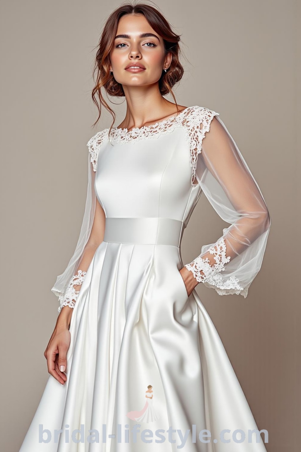 Elegant minimalist wedding dress featuring a satin A-line skirt, sheer long sleeves with lace trim, and a modest boat neckline. bridal-lifestyle.com