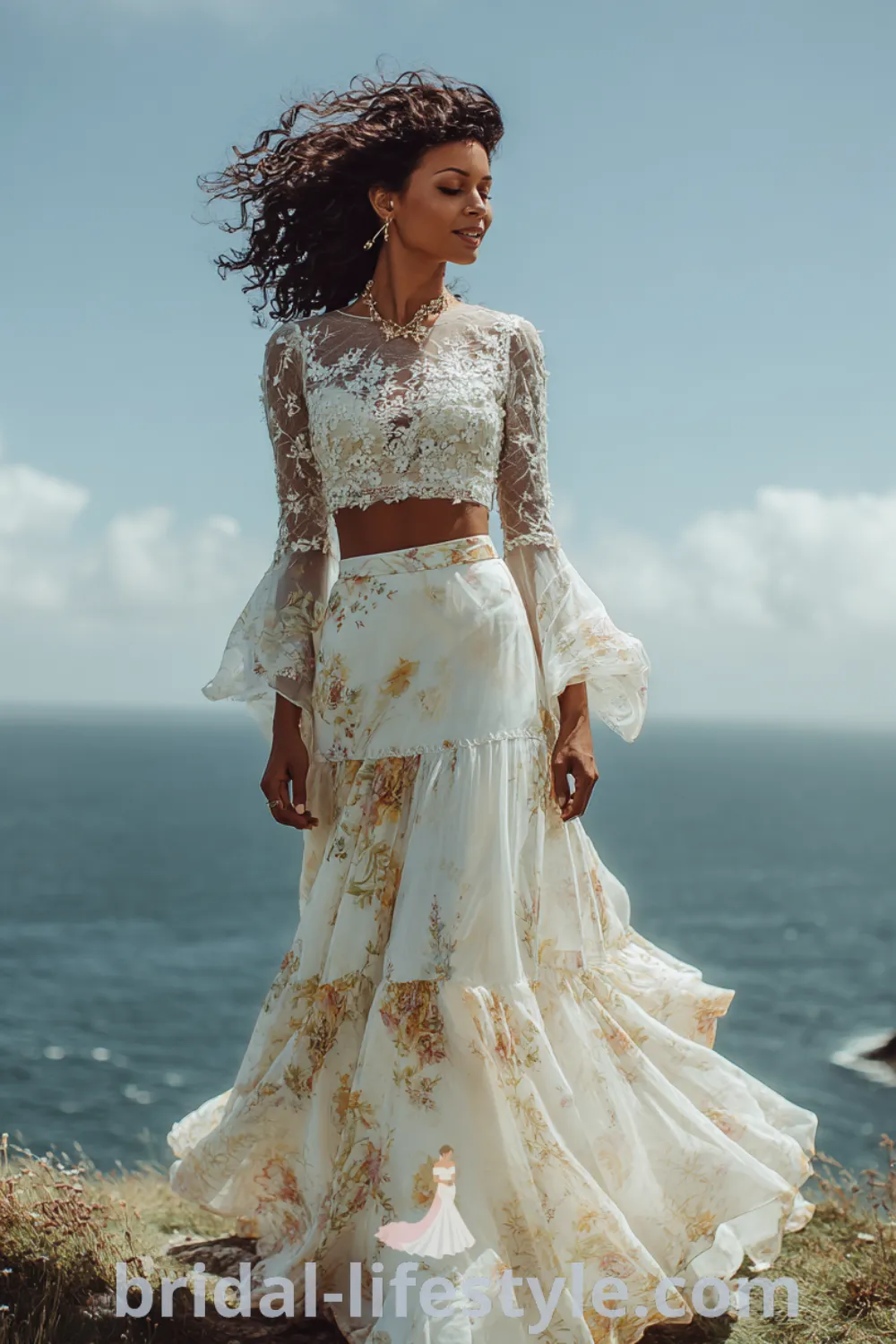 Boho flowery wedding dress with lace crop top, tiered chiffon skirt, whimsical floral details, ethereal bridal look.