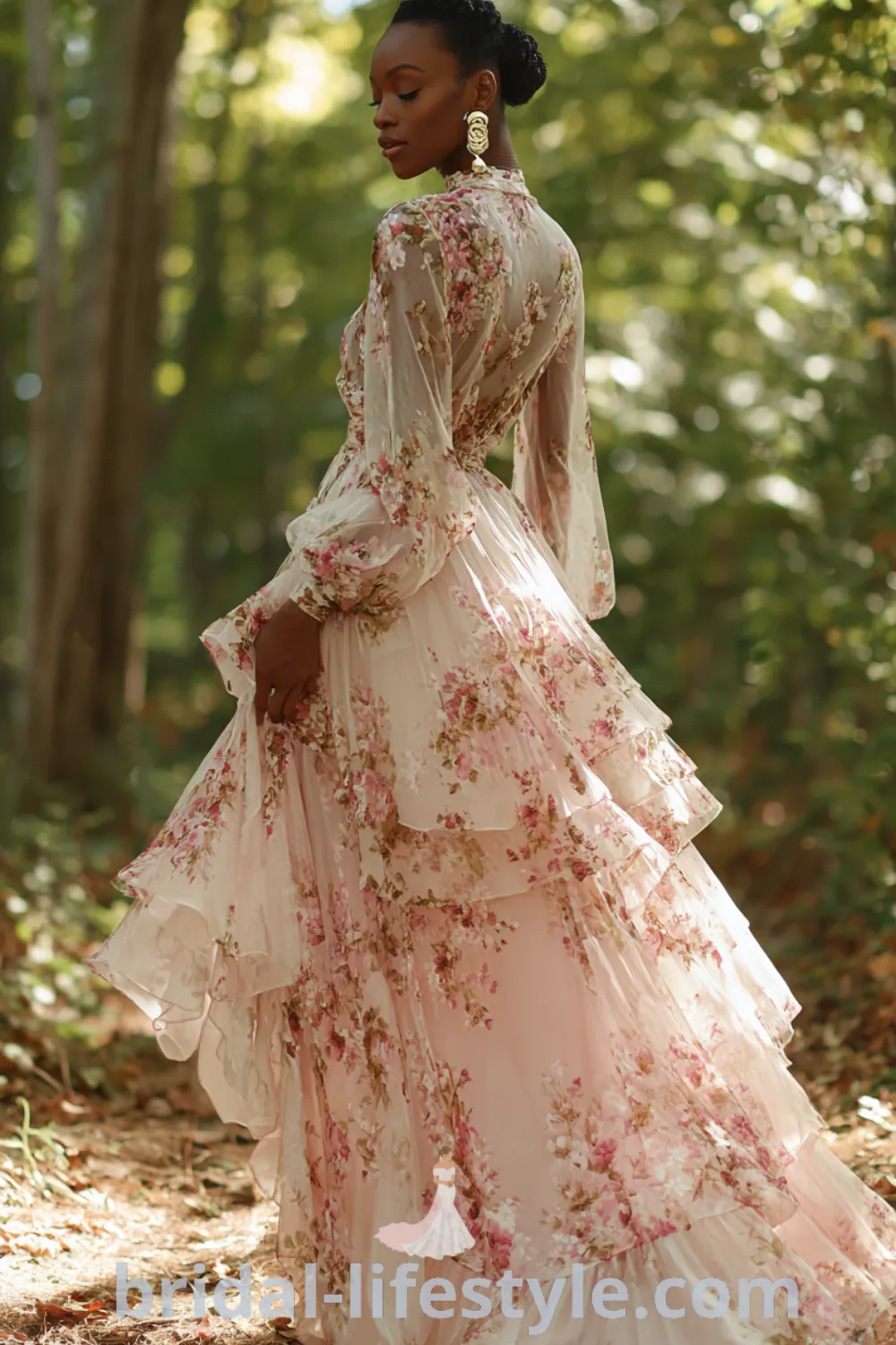 Whimsical floral wedding dress with A-line silhouette, embroidered wildflowers, lightweight chiffon, free-spirited bridal style.