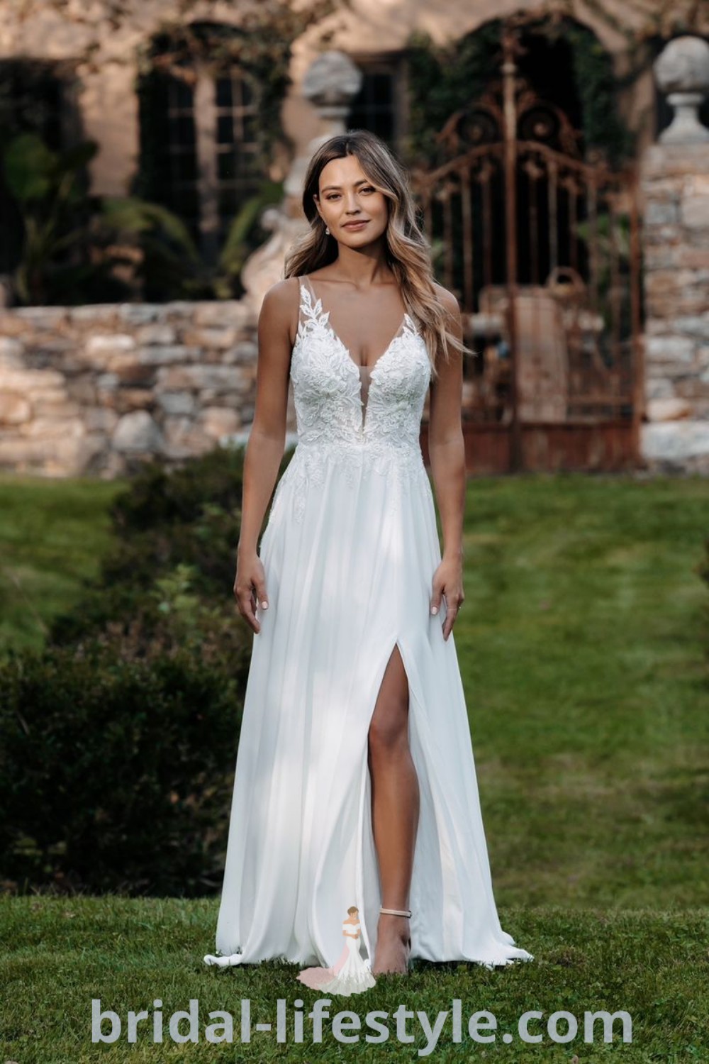 A woman in an elegant white A-line wedding dress stands on grass, showcasing romantic bridal trends from Allure Bridal, Allure Romance, and more. Ideal for plus size brides, this stunning dress represents the best of bridal aesthetics and is featured on bridal-lifestyle.com.