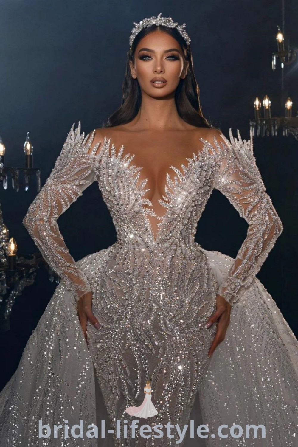 An elegant woman in a silver gown with long sleeves, showcasing a dreamy bridal style. This stunning dress combines contemporary trends with timeless elegance, perfect for brides seeking inspiration for their special day. Explore more at bridal-lifestyle.com.