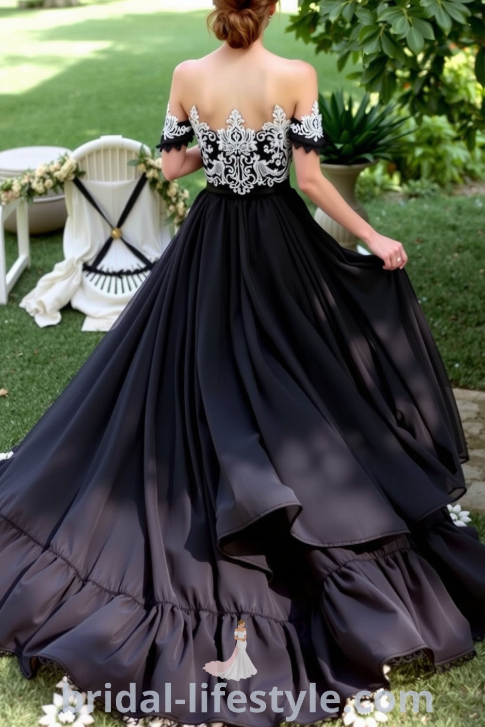 Wedding dress with flowing black chiffon layers, off-the-shoulder silhouette, intricate lace appliqués, and ruffled skirt, ideal for an outdoor celebration. bridal-lifestyle.com