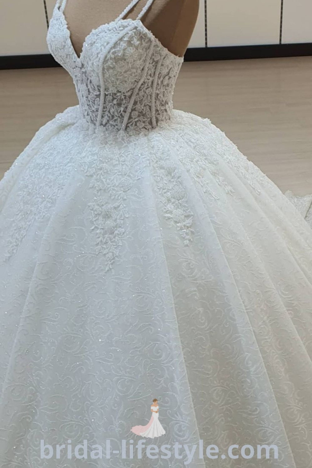 An elegant satin mermaid wedding dress on display in a store, showcasing the best of bridal trends with a classic yet modern style. This gown is perfect for dreamy brides seeking inspiration, featuring elements from big wedding dresses and lace ballgowns. Explore more on bridal-lifestyle.com.