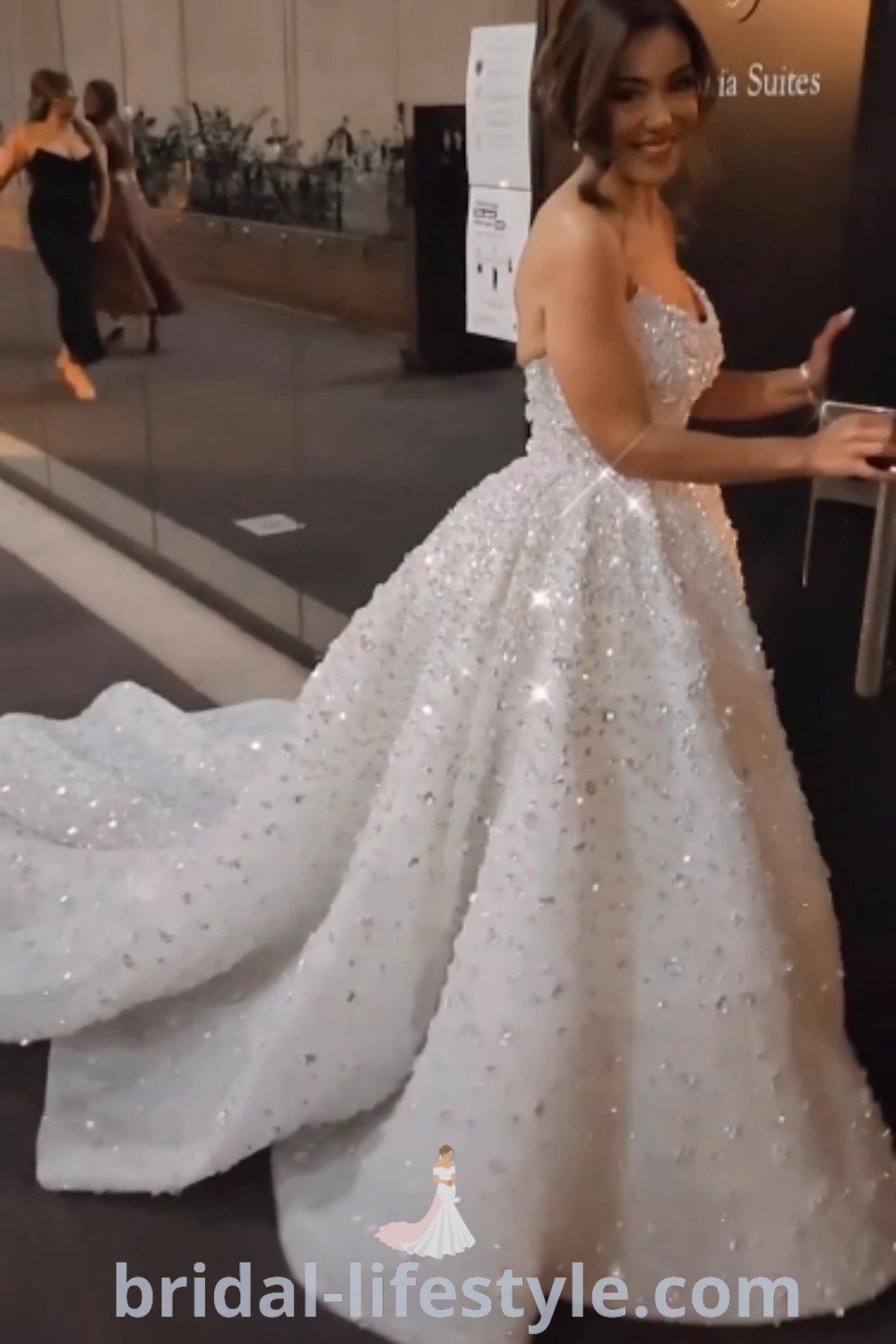 An elegant long sleeve sparkle wedding dress featuring romantic and shimmering design elements, perfect for dreamy brides. This dress showcases the best trends in wedding gowns and is ideal for those seeking inspiration and uniqueness on their special day at bridal-lifestyle.com.