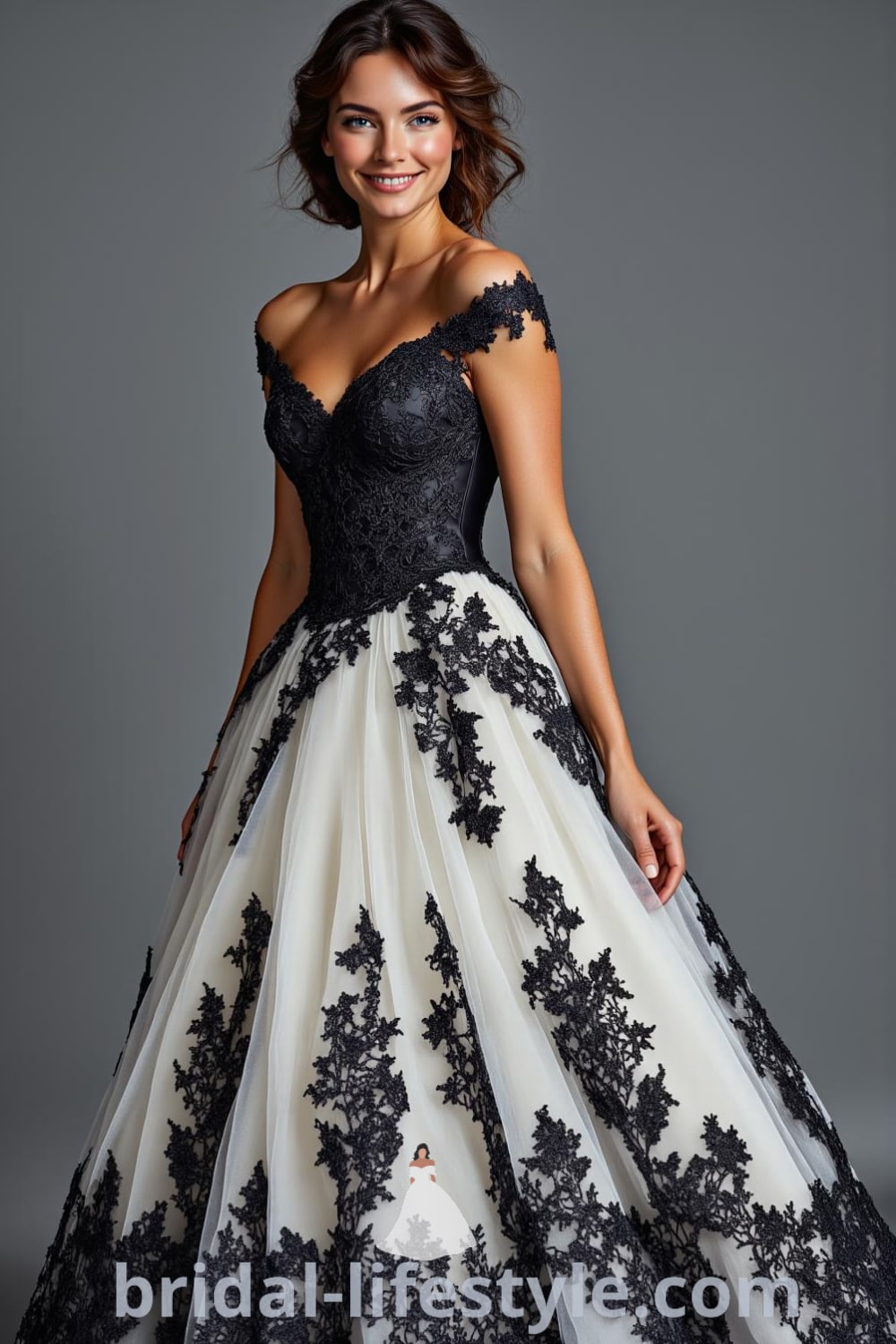 A stunning princess black wedding dress with a satin bodice and voluminous tulle skirt, featuring an off-the-shoulder neckline and intricate black lace appliqués. bridal-lifestyle.com