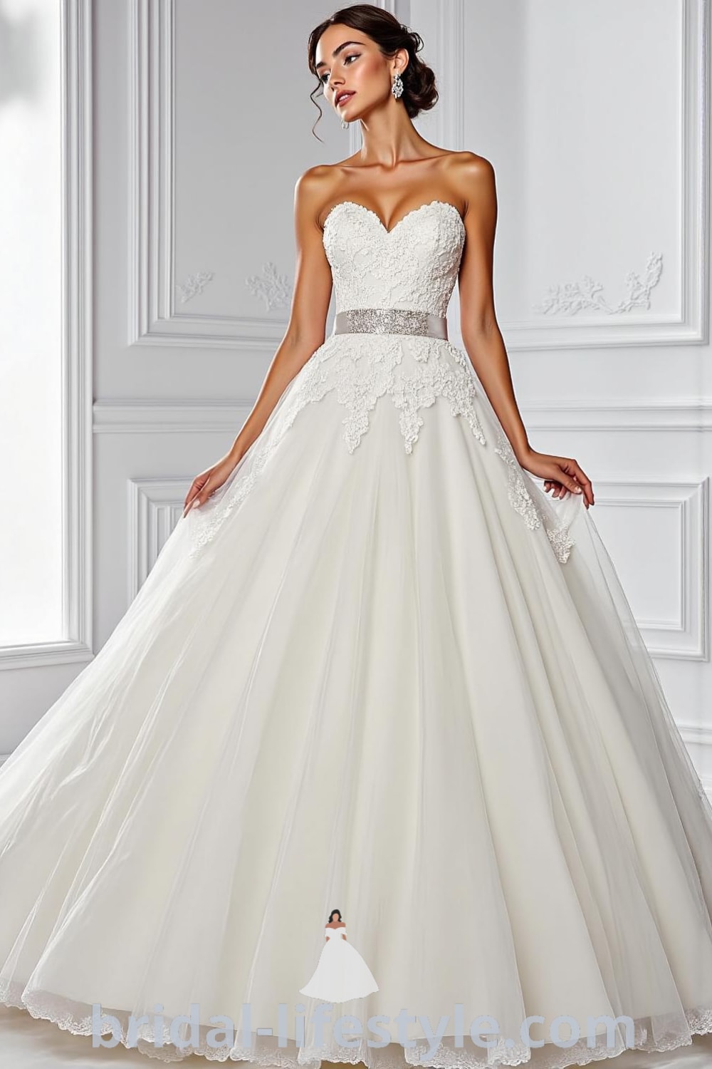Stunning princess wedding dress with a lavish tulle skirt, intricate lace appliqués, delicate beadwork on the sweetheart bodice, and a satin sash at the waist. bridal-lifestyle.com