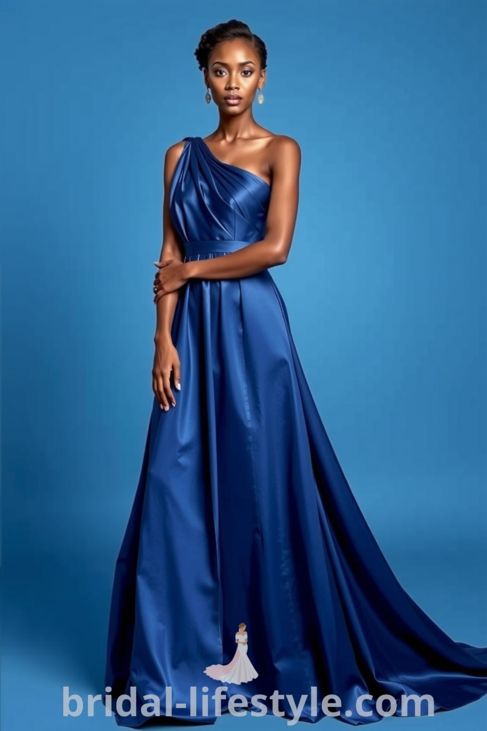 One-shoulder blue satin bridesmaid dress on a Black bride, featuring a flowing skirt and delicate bodice pleating, showcasing elegance for dreamy brides. bridal-lifestyle.com