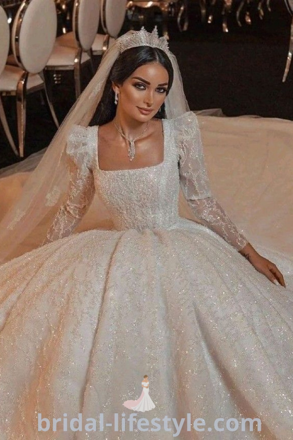 An elegant white long sleeve wedding gown designed for Middle Eastern brides, featuring traditional Arabic and Lebanese styles. Ideal for bridal trends, this dress complements outfits with hijab and embodies the aesthetic ideas of dreamy brides. Explore more inspiration at bridal-lifestyle.com.