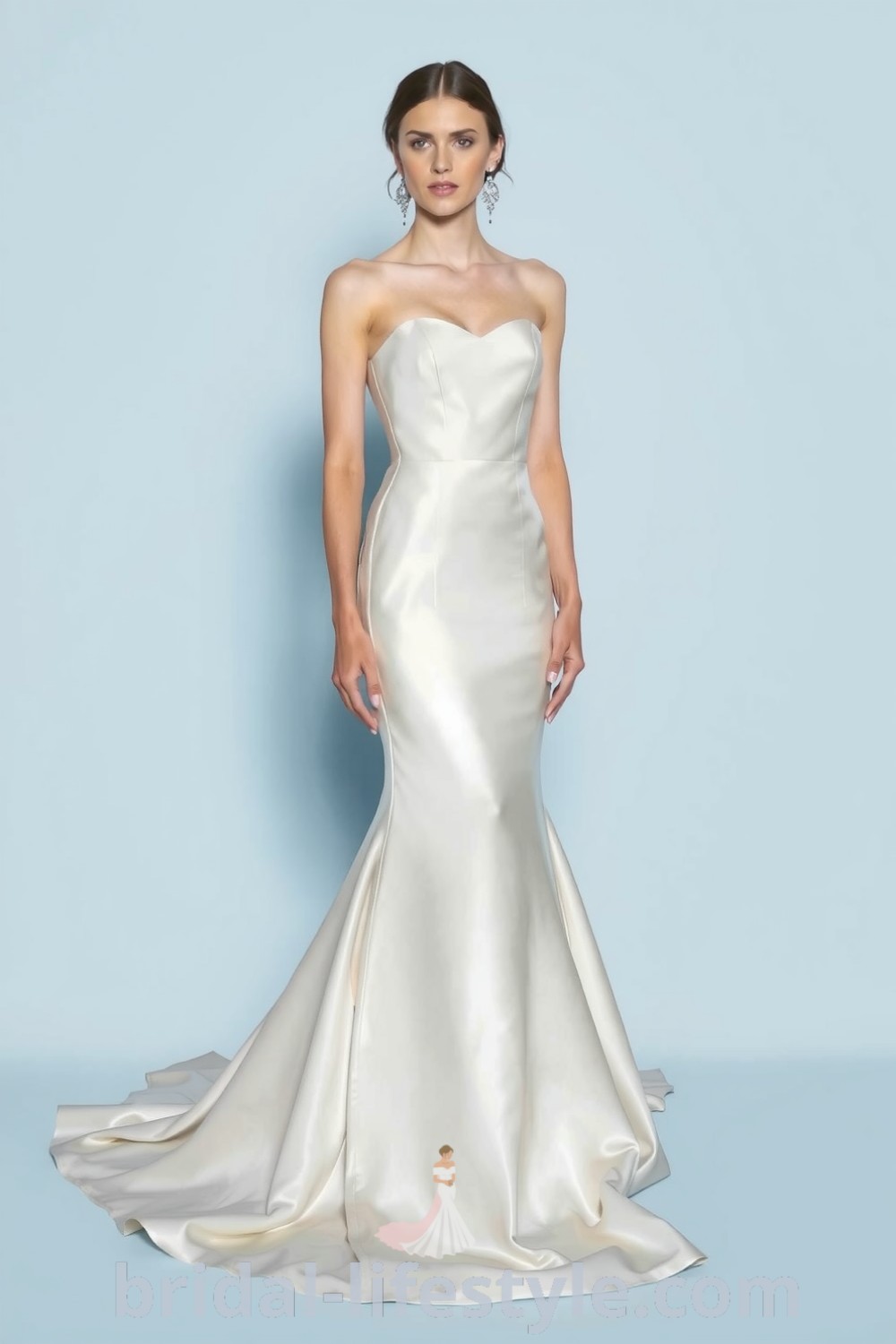 Mermaid wedding dress in satin with elegant draping, subtle neckline detailing, and a stunning silhouette for dreamy brides. bridal-lifestyle.com