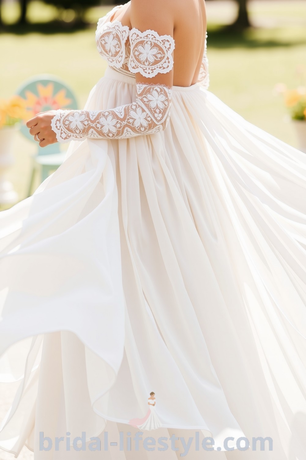 Bohemian wedding dress made of flowing chiffon, featuring intricate lace sleeves, a delicate waistband, and subtle floral embroidery, creating a dreamy silhouette perfect for outdoor ceremonies. bridal-lifestyle.com