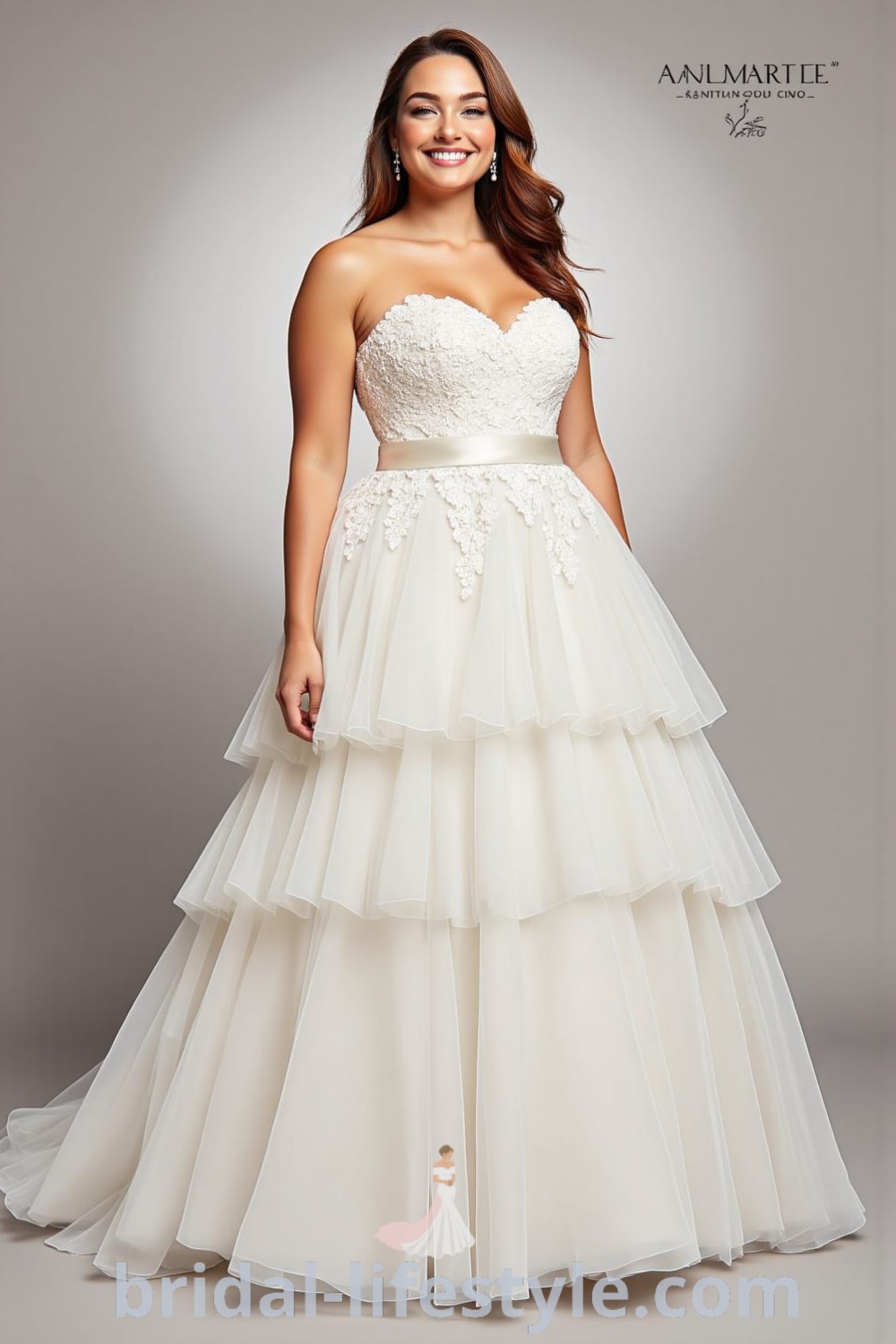 A-plus size A-line wedding dress with structured satin bodice, soft tiered tulle skirt, and lace appliqués, featuring an adjustable satin sash for an enhanced silhouette. bridal-lifestyle.com