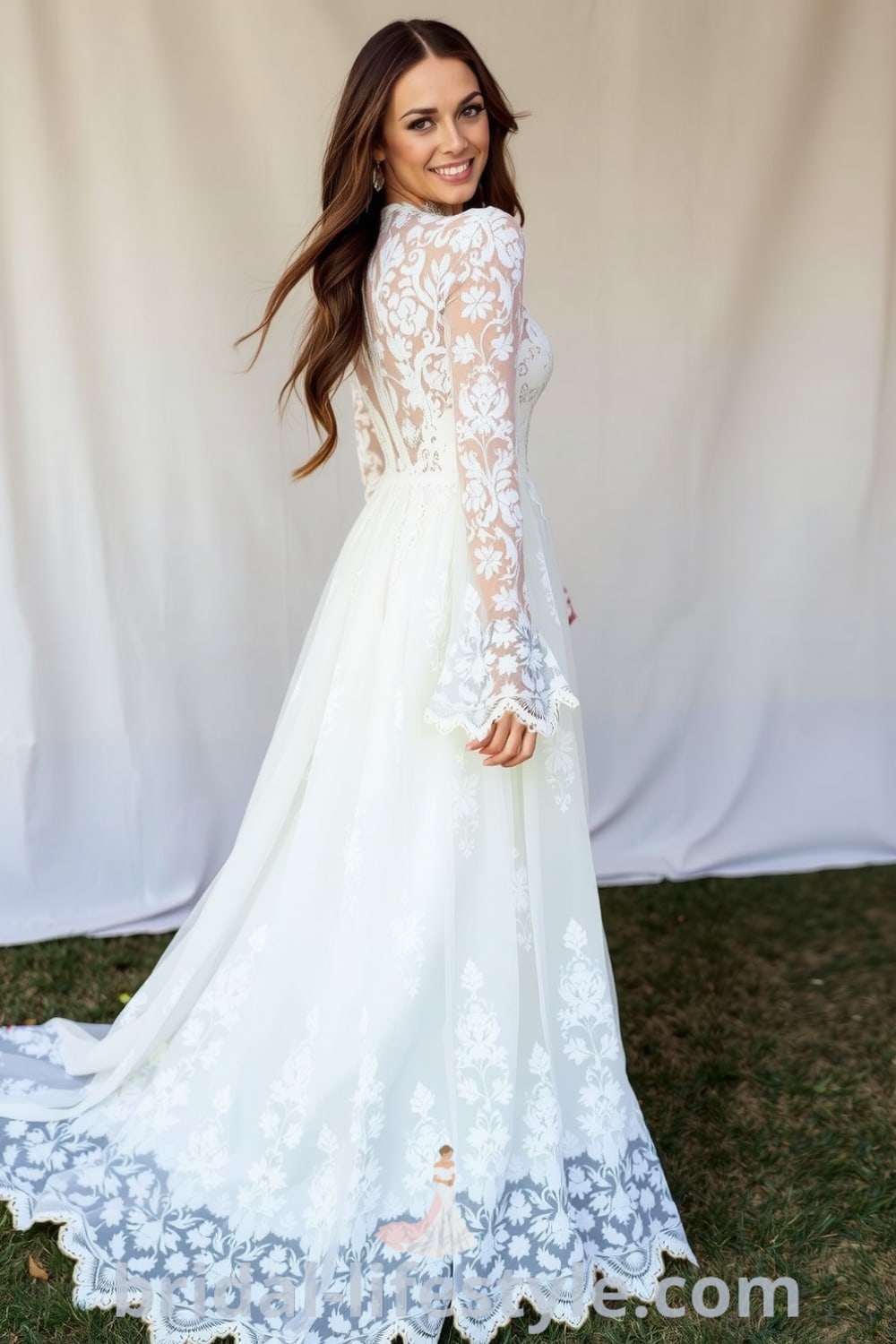 Boho long sleeve lace wedding dress with intricate floral patterns, sheer sleeves, and a flowing skirt, featuring scalloped edges and a romantic elegance, perfect for outdoor ceremonies. bridal-lifestyle.com