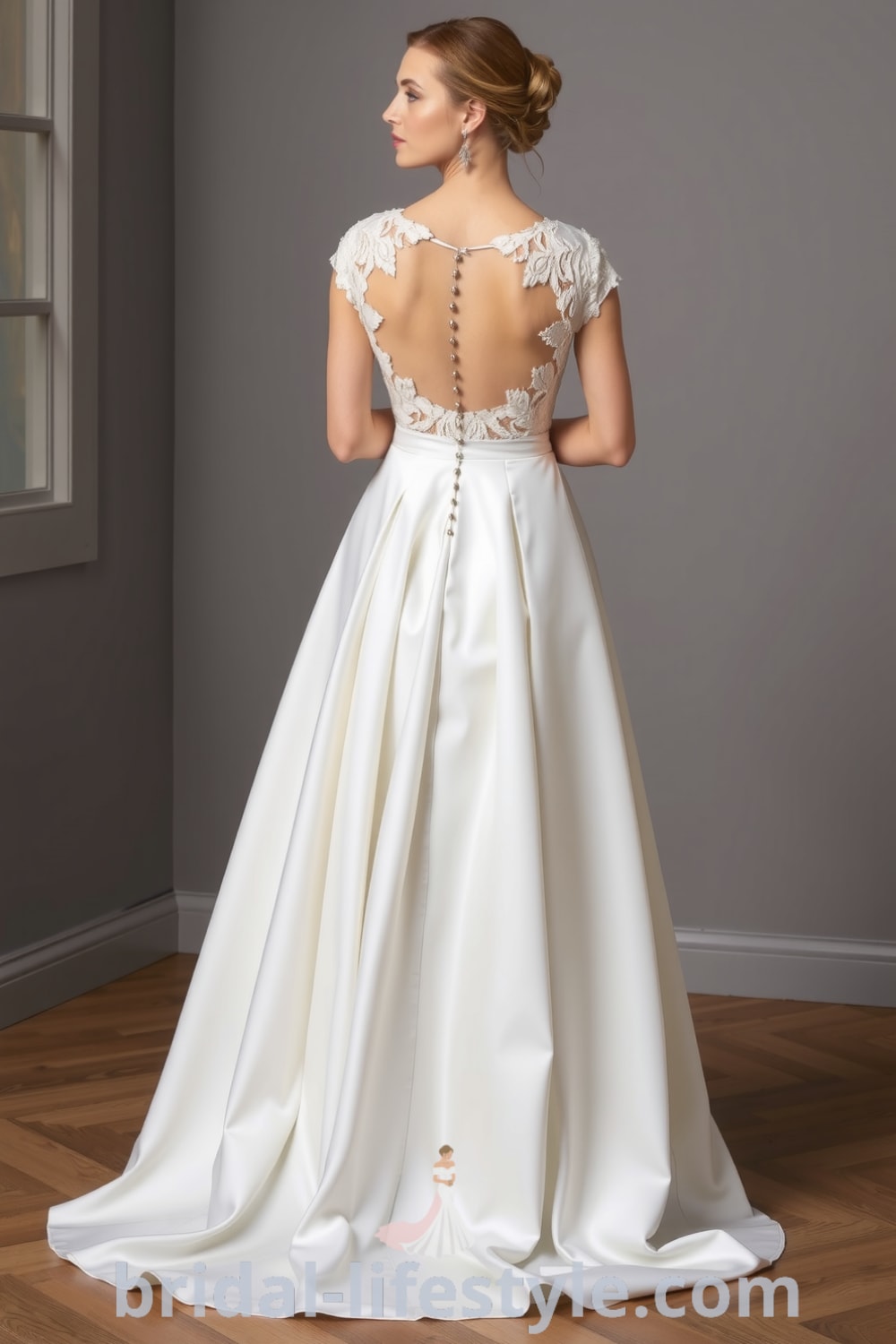 A-Line wedding dress with romantic sweetheart neckline, flowing satin skirt, intricate lace detailing on the bodice, and elegant covered buttons on the back. bridal-lifestyle.com