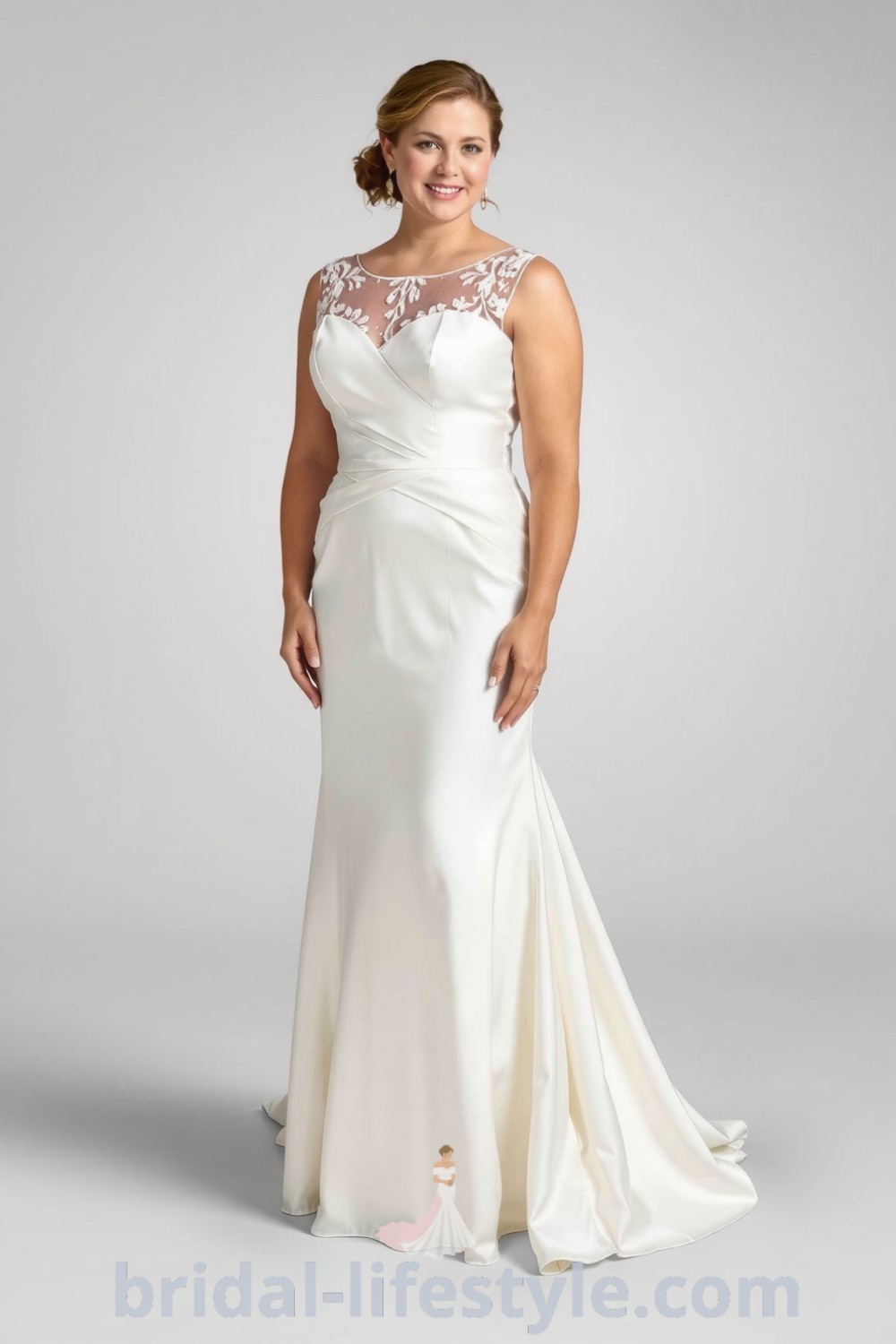 Plus size fit and flare wedding dress made of luxurious satin, featuring lace appliqués along the neckline and train, designed to enhance curves and elegance. bridal-lifestyle.com