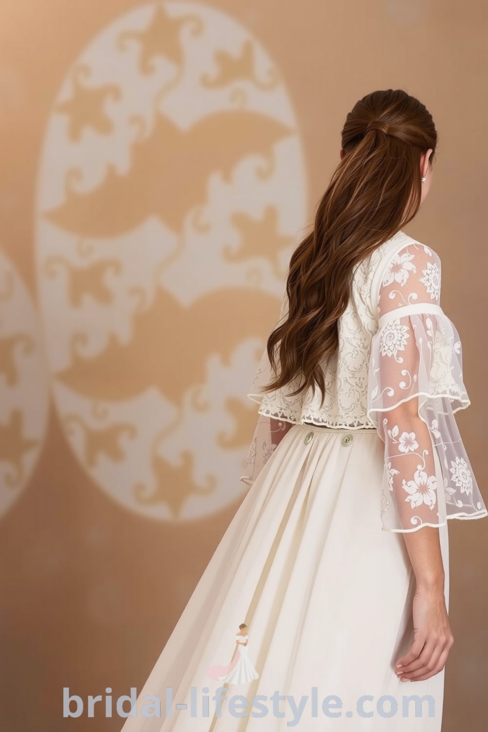 Two-piece wedding dress featuring a lace crop top with floral patterns, lightweight chiffon A-line skirt, and ethereal sleeves, designed for a bohemian-inspired celebration. bridal-lifestyle.com