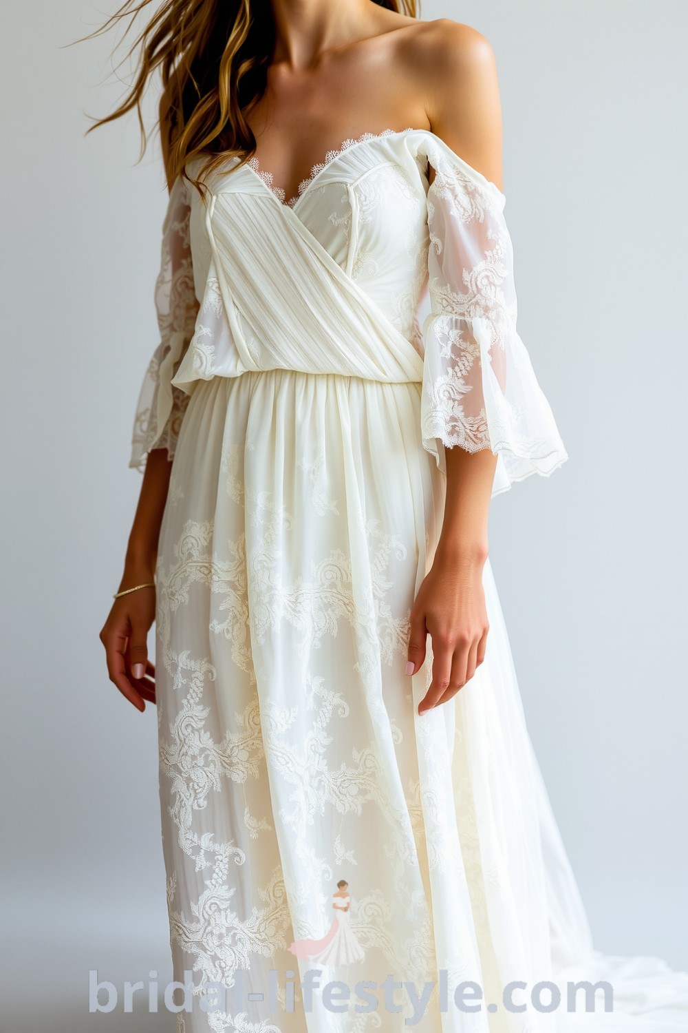 Boho beach wedding dress with soft lace, off-the-shoulder sleeves, and cinched waist, perfect for romantic brides looking for dreamy, elegant styles. bridal-lifestyle.com