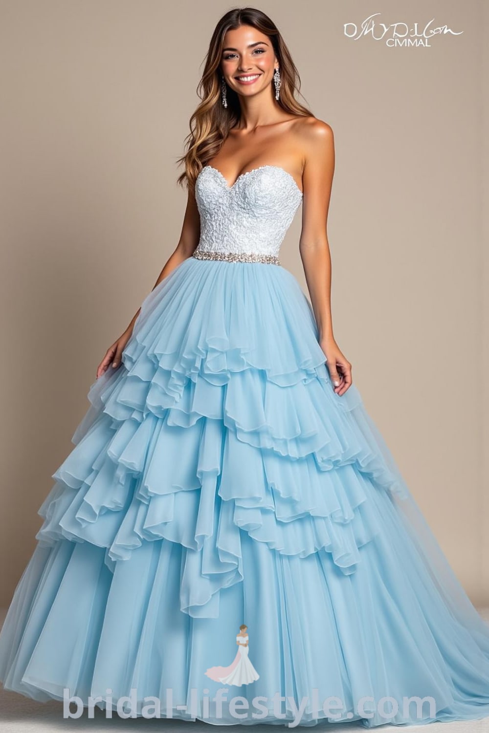Princess Blue wedding dress with intricate lace overlay, voluminous tulle skirt, and crystal embellishments at the waist. bridal-lifestyle.com