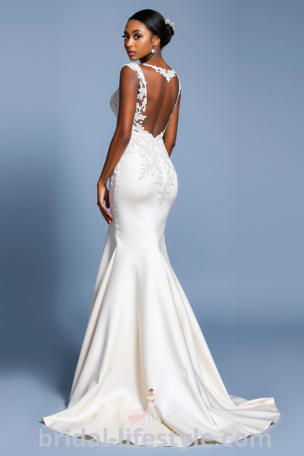 Mermaid wedding dress elegantly hugging the curves of a Black bride, featuring intricate lace detailing, an open back, and a dramatic satin skirt. Ideal inspiration for dreamy brides, with elegant aesthetic ideas for the special day. bridal-lifestyle.com