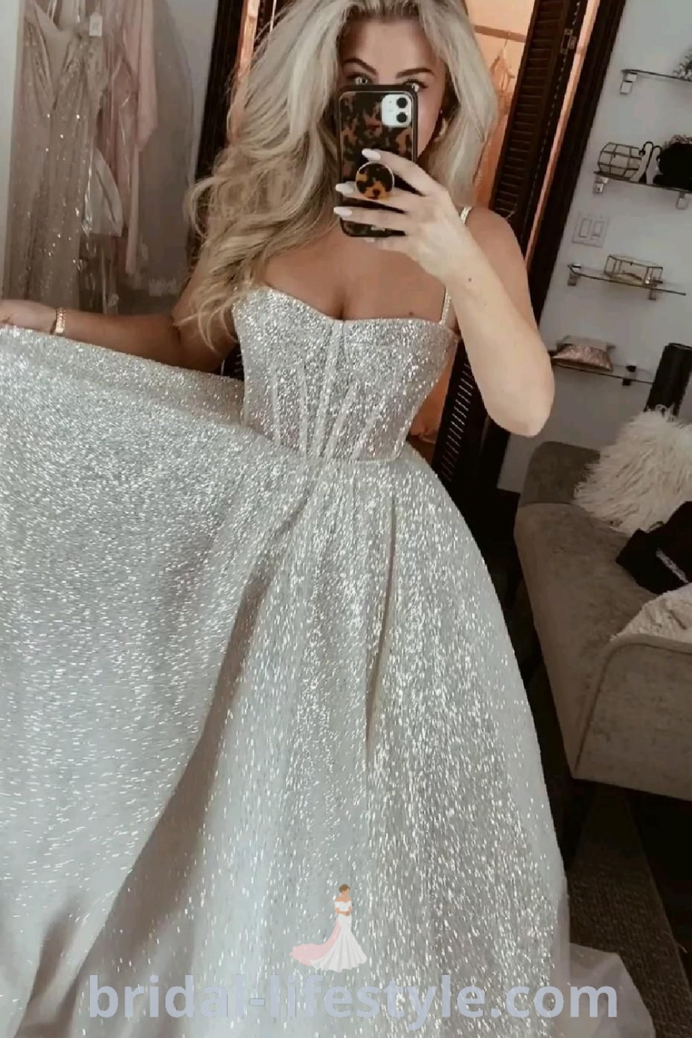 An elegant Silver Glitter Wedding Dress featuring a sparkly design, perfect for brides looking for a cute and glamorous gown for their special day. This dress embodies current bridal trends and aesthetics that cater to every bride