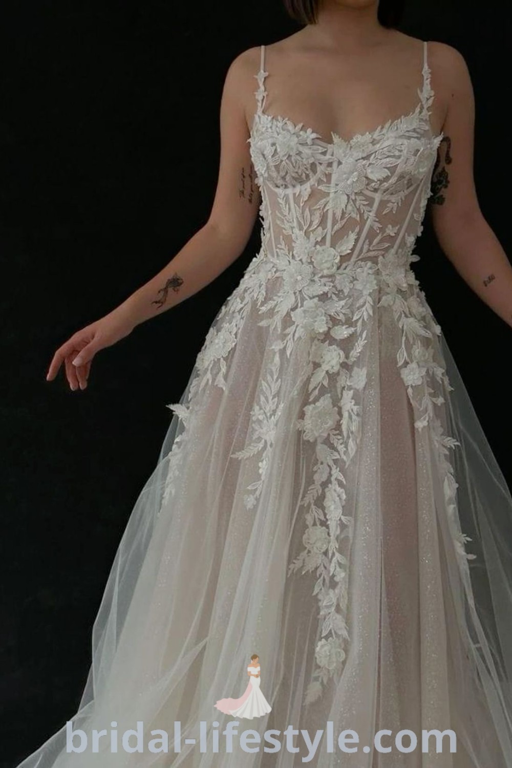 A whimsical forest core wedding dress featuring floral elements, perfect for dreamy brides seeking romantic and enchanting aesthetics. This gown represents the best trends in woodland fairytale inspiration, ideal for the special day. Discover more at bridal-lifestyle.com.