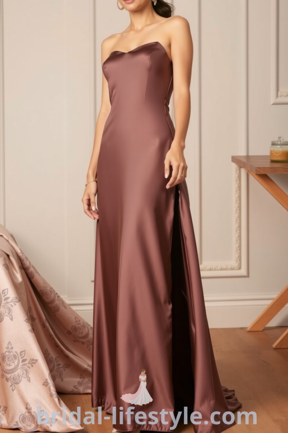 Sophisticated long satin bridesmaid dress showcased on bridal-lifestyle.com, featuring a side slit and elegant design, ideal for every bride