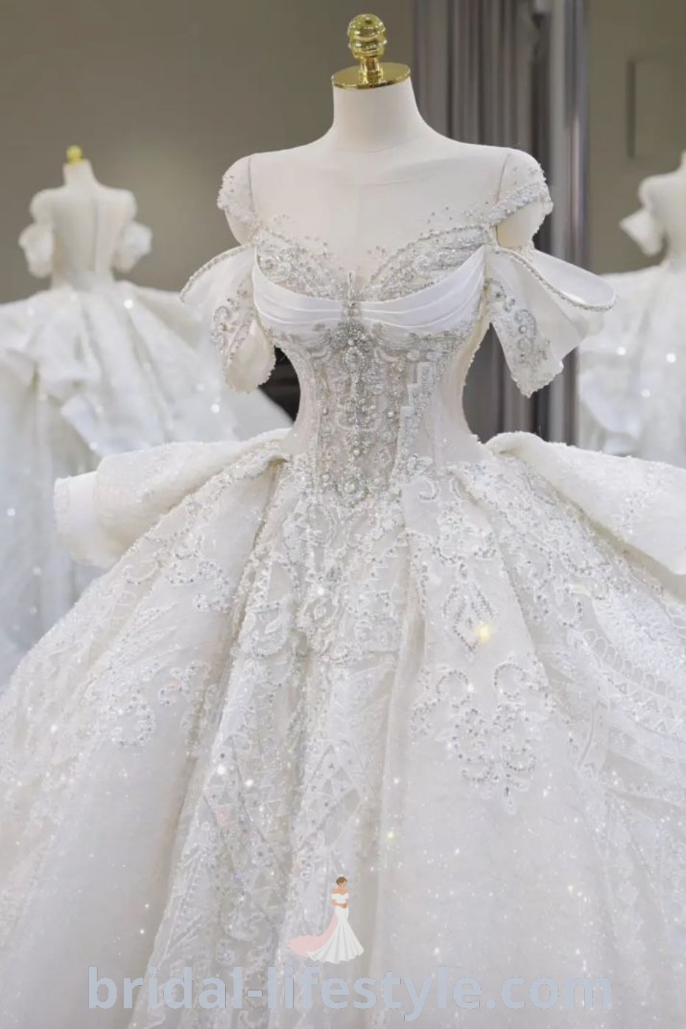 An elegant white wedding dress on display in front of mannequins dressed in various gowns, representing trends in bridal fashion. Perfect for dreamy brides seeking inspiration for the special day, showcasing the best fancy wedding dresses and aesthetic ideas at bridal-lifestyle.com.