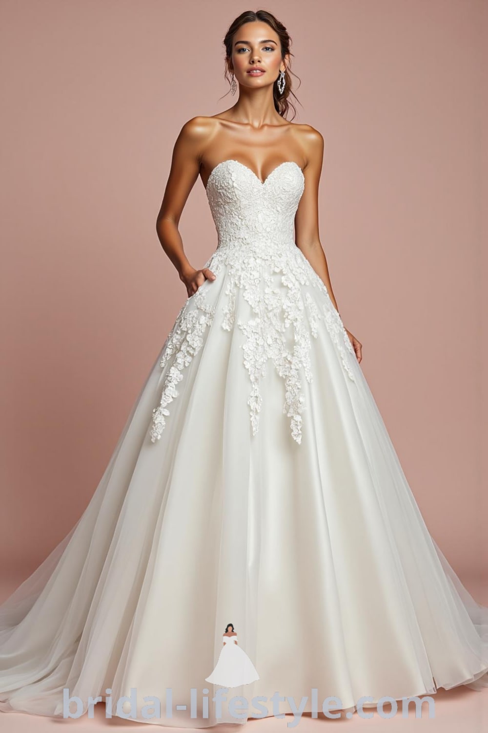 Princess Classy wedding dress featuring a fitted satin bodice with lace appliqués, voluminous tulle skirt, sweetheart neckline, and a subtle train. bridal-lifestyle.com