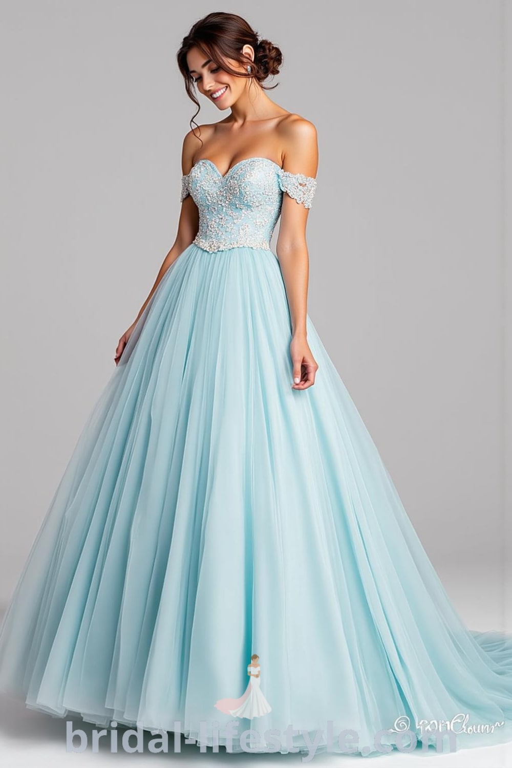 Princess Blue wedding dress with a voluminous tulle skirt, fitted satin bodice adorned with embroidery and sequins, and delicate off-the-shoulder straps. bridal-lifestyle.com