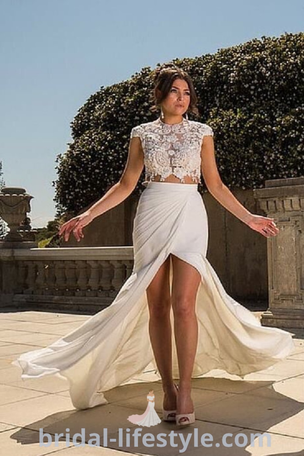 An elegant two piece wedding dress featuring a boho skirt and top, designed for brides and vow renewals. This stunning outfit embodies wedding trends and offers versatility, making it perfect for every bride