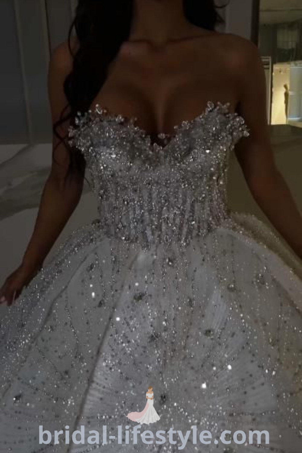 An elegant big white sparkly wedding dress featuring crystal sleeves and rhinestone details, perfect for brides seeking a dreamy and romantic aesthetic. This sparkling ball gown is a top choice for weddings, providing elegance and inspiration for every bride