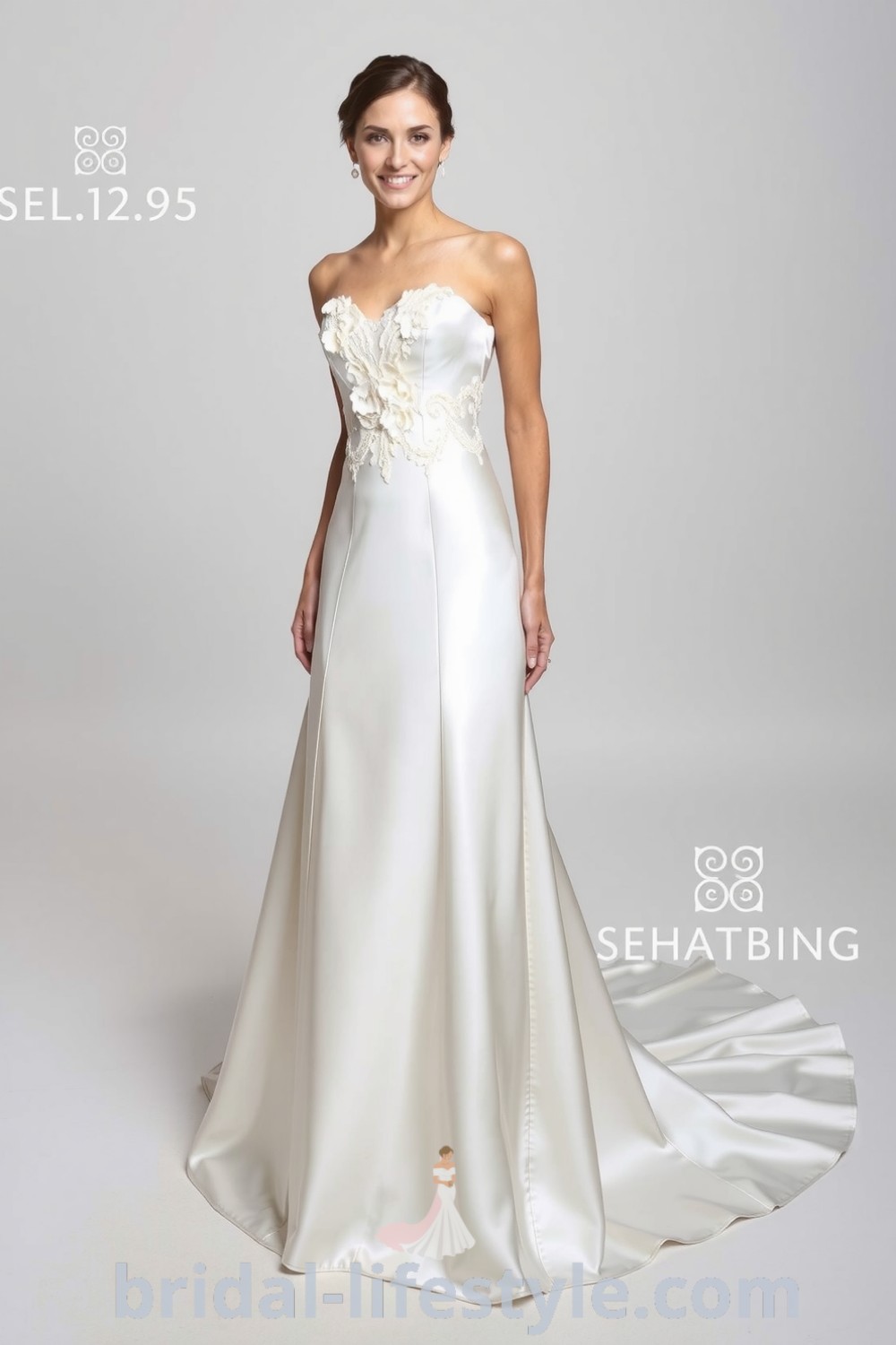 Elegant fit and flare satin wedding dress with a sweetheart neckline, floral lace appliqués, and a flowing train, perfect for dreamy brides on their special day. bridal-lifestyle.com