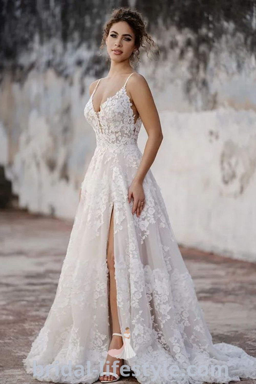 An elegant wedding dress designed for dreamy brides, featuring a deep V A-line silhouette and lace details, ideal for barn weddings. This gown provides the perfect fit for busty women, merging modern trends with romantic charm. Discover the best inspiration looks for your special day at bridal-lifestyle.com.