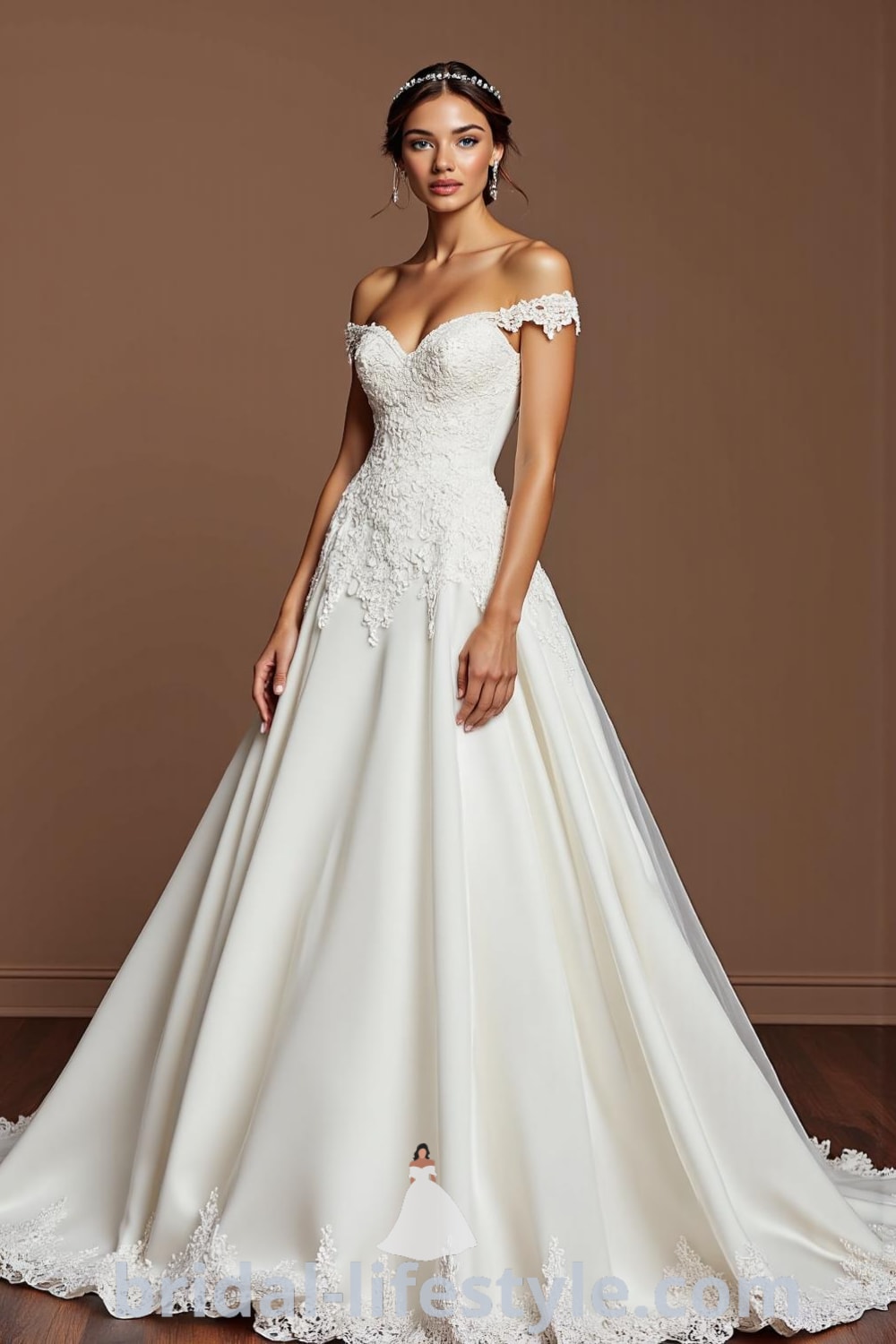 Elegant off-shoulder wedding dress with a satin bodice, intricate lace appliqués, delicate beading, and a voluminous skirt. bridal-lifestyle.com