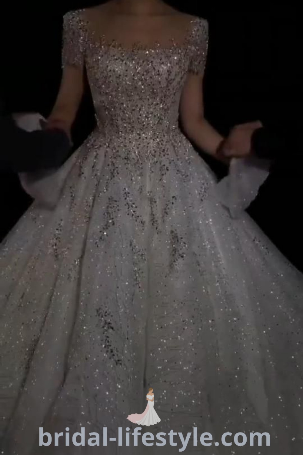 A sparkly wedding dress mermaid silhouette designed for boho chic brides, showcasing extravagant details for a glamorous look. This stunning gown represents the best trends for dreamy brides and offers aesthetic inspiration for every unique taste at bridal-lifestyle.com.