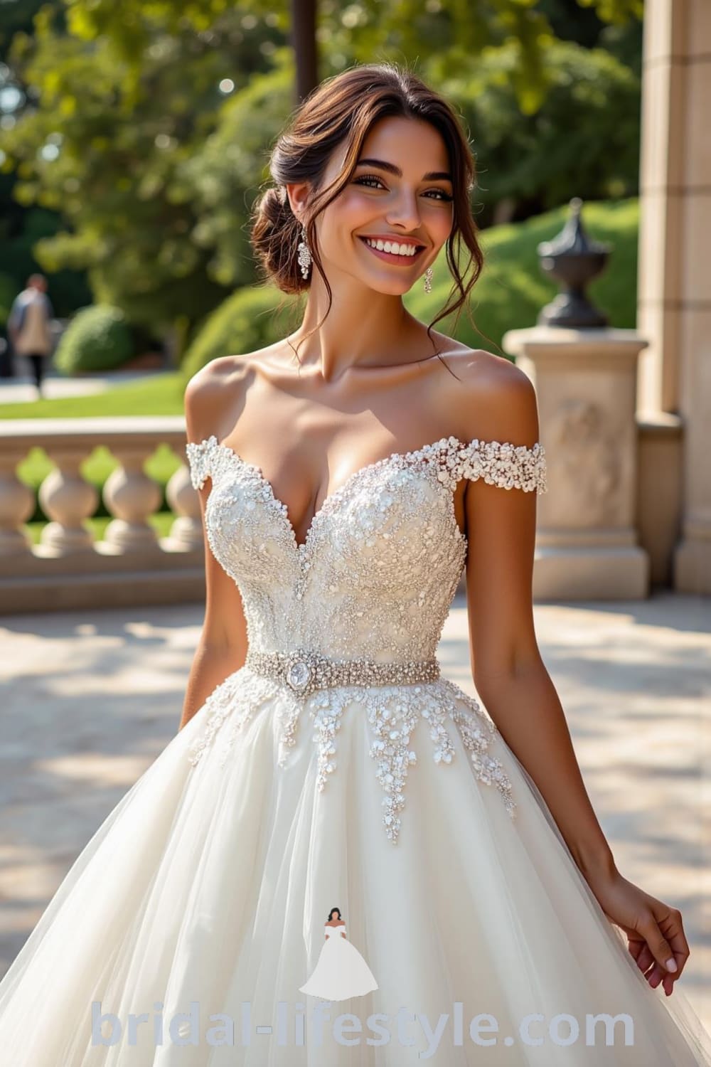 A stunning Princess Glitter wedding dress with a fitted bodice adorned with beadwork, a voluminous layered tulle and satin skirt, and delicate off-the-shoulder straps. bridal-lifestyle.com