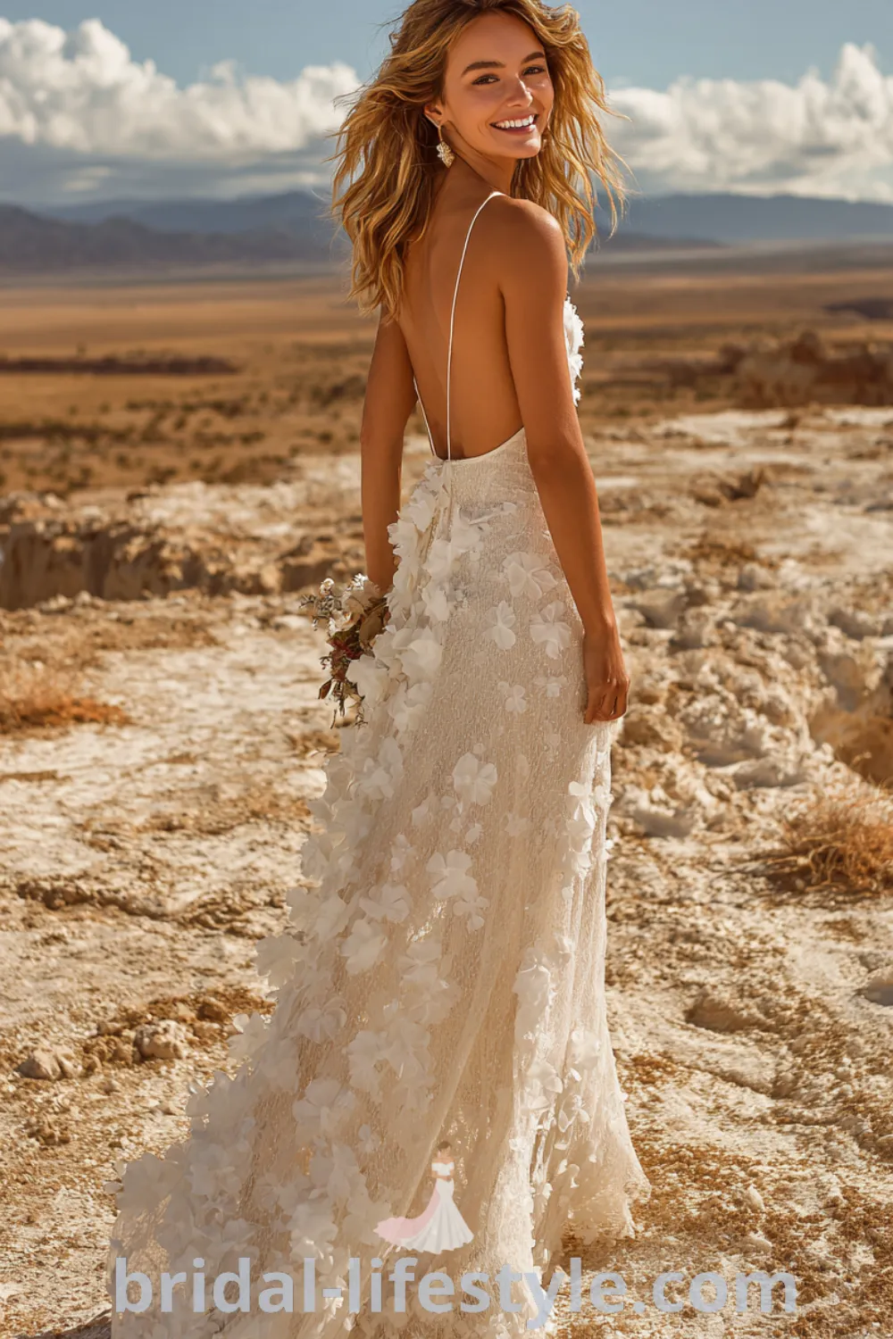 Free-spirited floral wedding dress with 3D appliques, open back, relaxed fit sheath gown, romantic boho wedding.