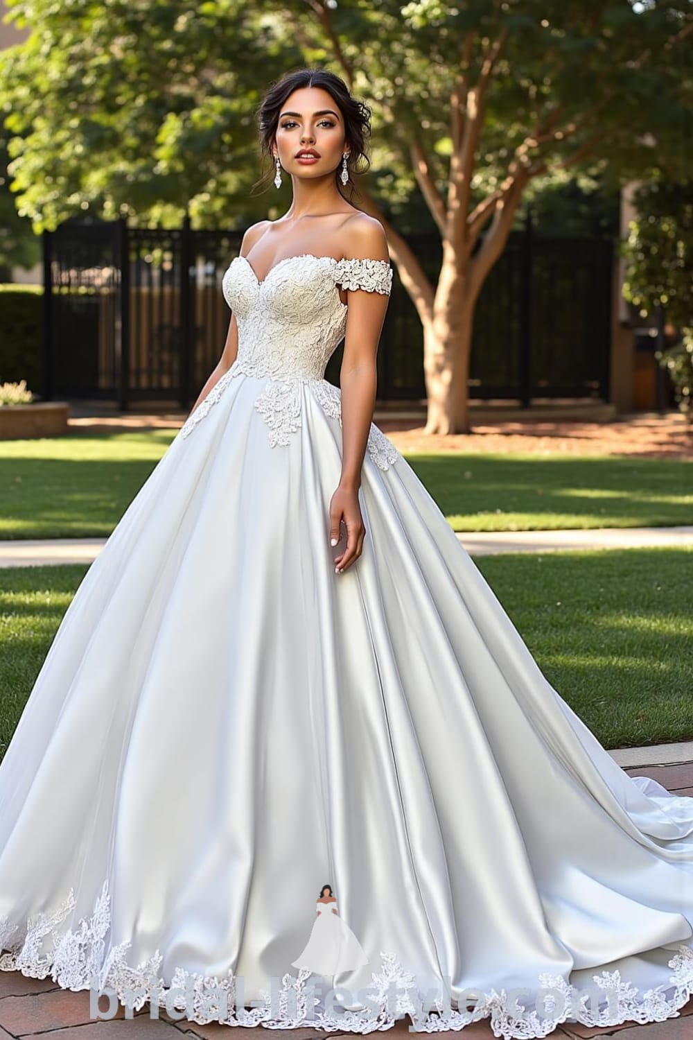 Princess Tail wedding dress with cascading satin skirt, fitted lace-appliquéd bodice, sweetheart neckline, and delicate sheer tulle overlay. bridal-lifestyle.com