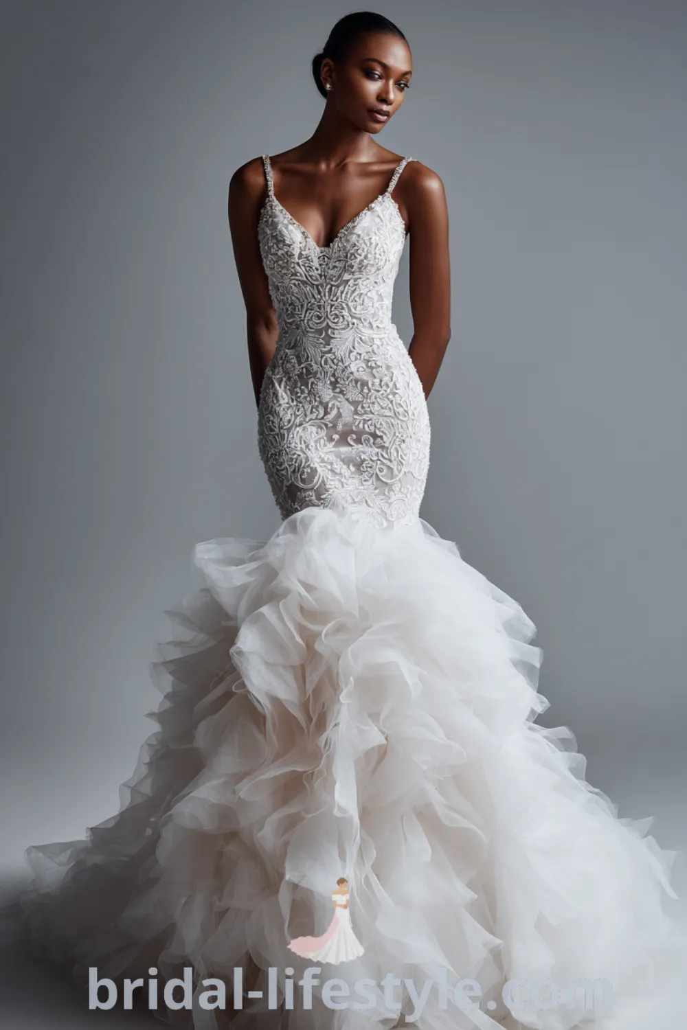 Elegant mermaid lace wedding dress with fitted bodice, dramatic lace mermaid gown, glamorous lace details, romantic wedding look.