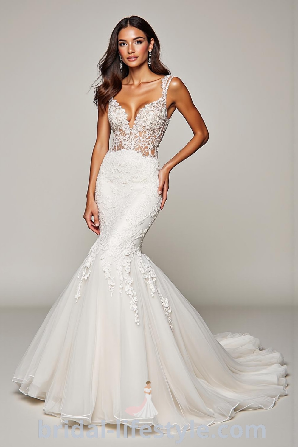 Elegant mermaid wedding dress made of luxurious satin with a detachable skirt, intricate lace detailing on the sweetheart neckline, and artisanal floral appliqués. bridal-lifestyle.com